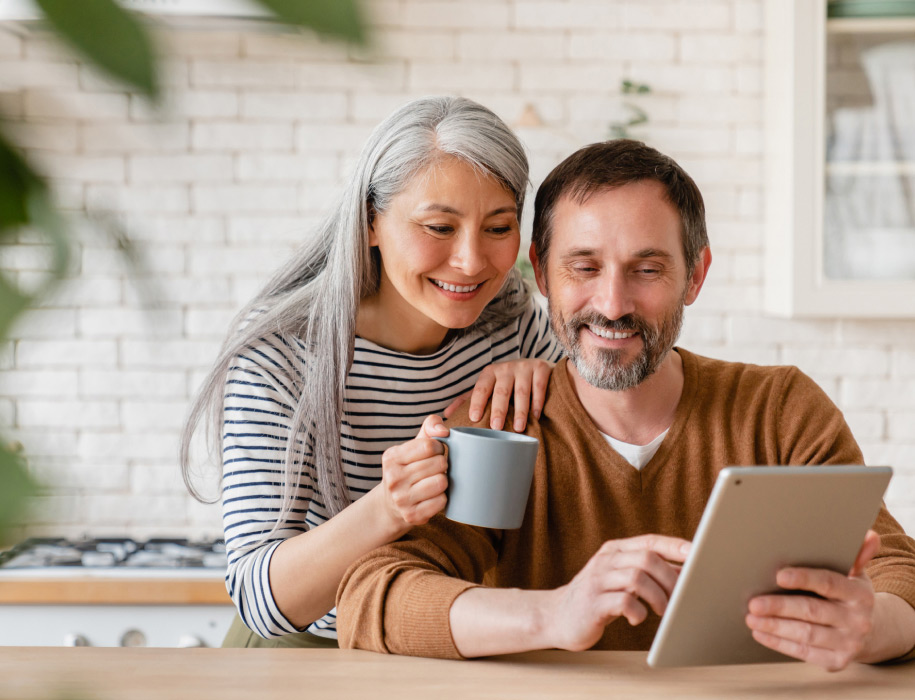 couple looking at tablet